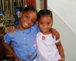 How adorable are Simone Biles and her little sister, Adria, taken shortly after they were adopted by their grandparents, Ron and Nellie Biles.